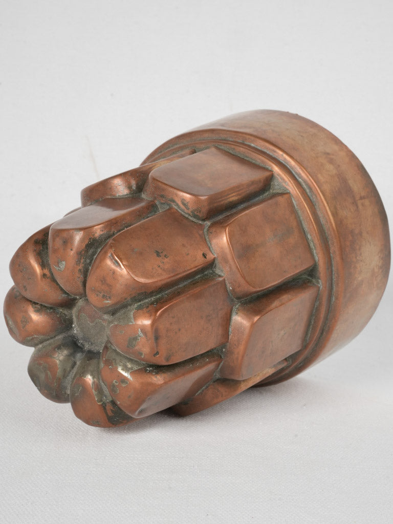 Sophisticated vintage copper jelly mold