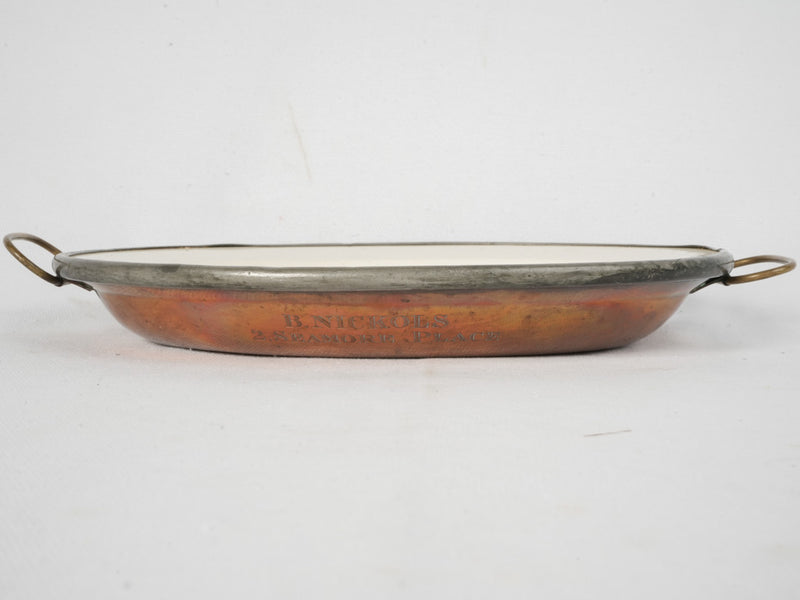 Charming brass and copper warming plate