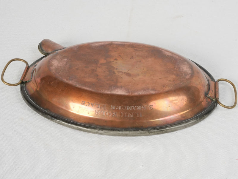 Classic 19th-century brass-handled food warmer