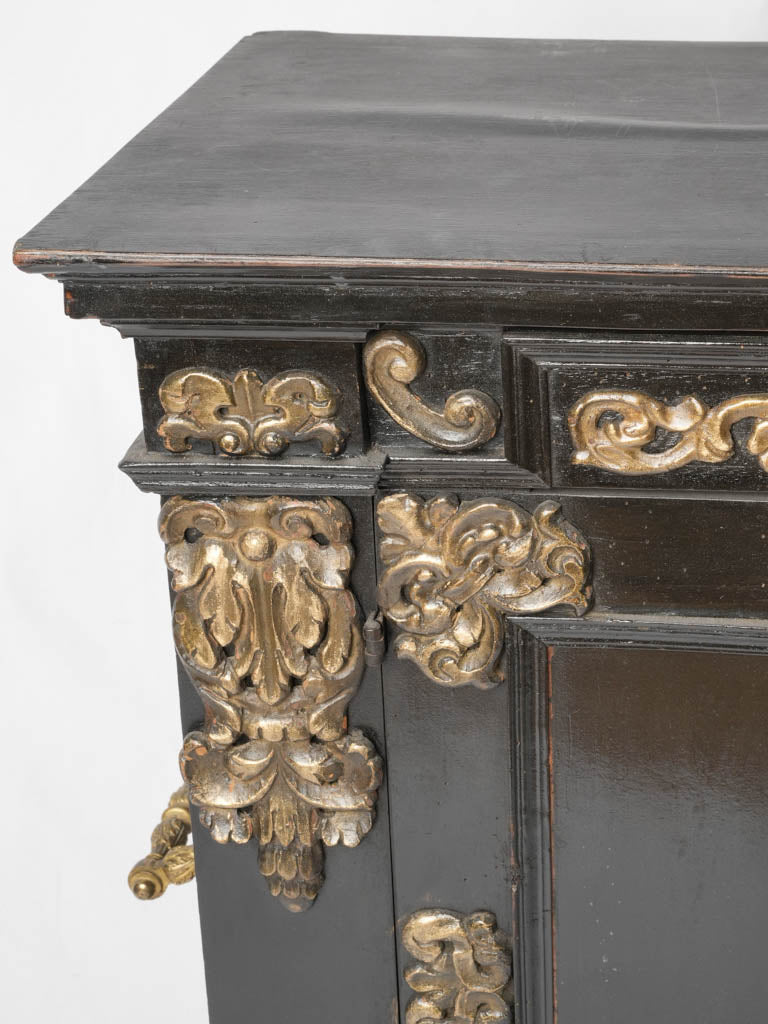 Sophisticated floral motif ebonized sideboard