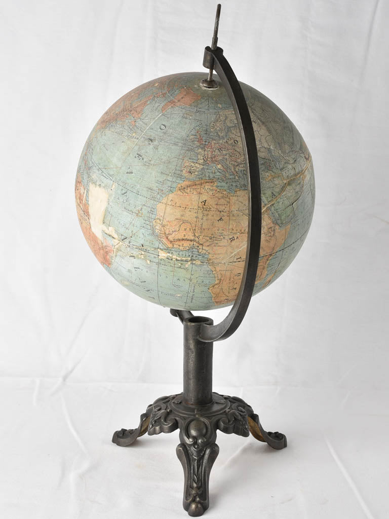 Old world globe on iron base