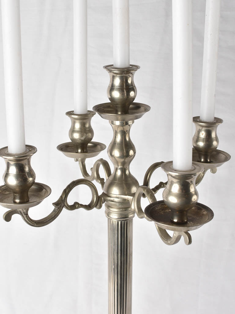 Silvery streamline candlestick from twentieth century