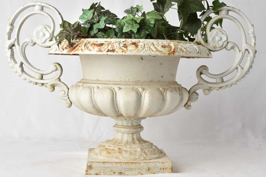 Weathered white patina iron urn