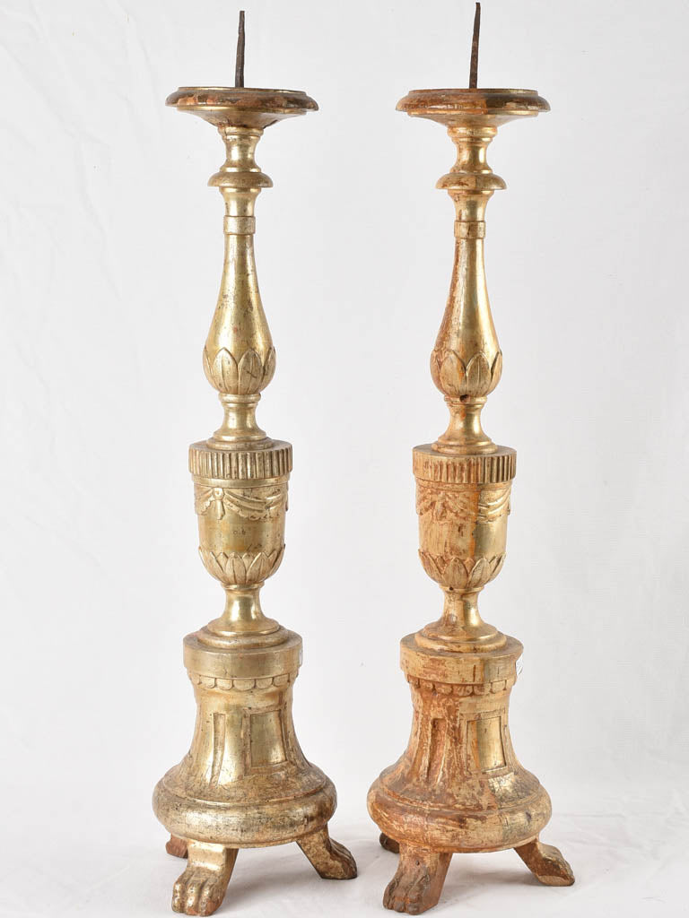 Pair of antique Italian gilded candlesticks 30"