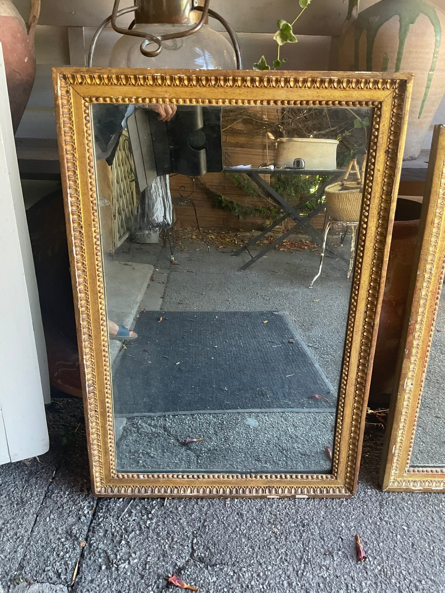 Hand-carved, aged Louis XVI mirrors 