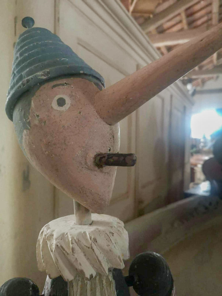 Detailed painted antique Pinocchio toy