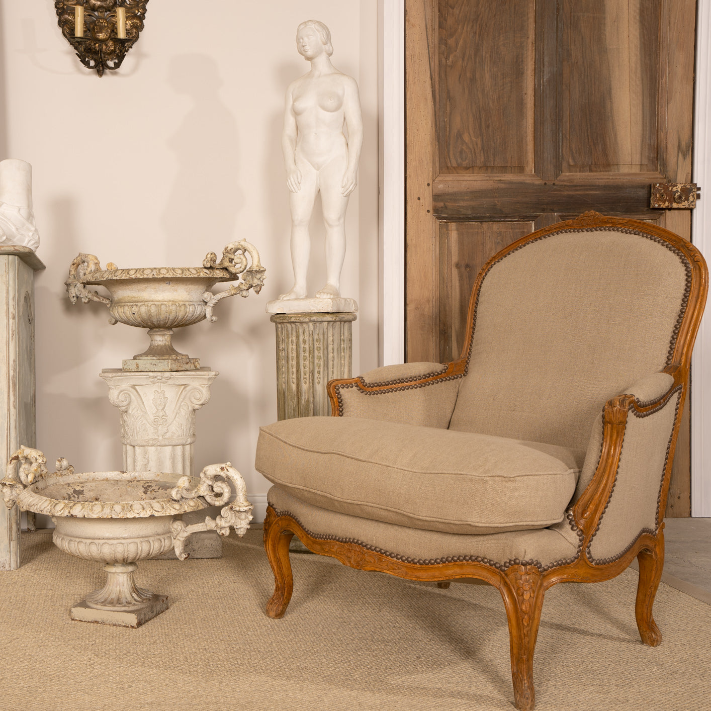 Large pair of 19th century Bergere armchairs with new linen uphostery