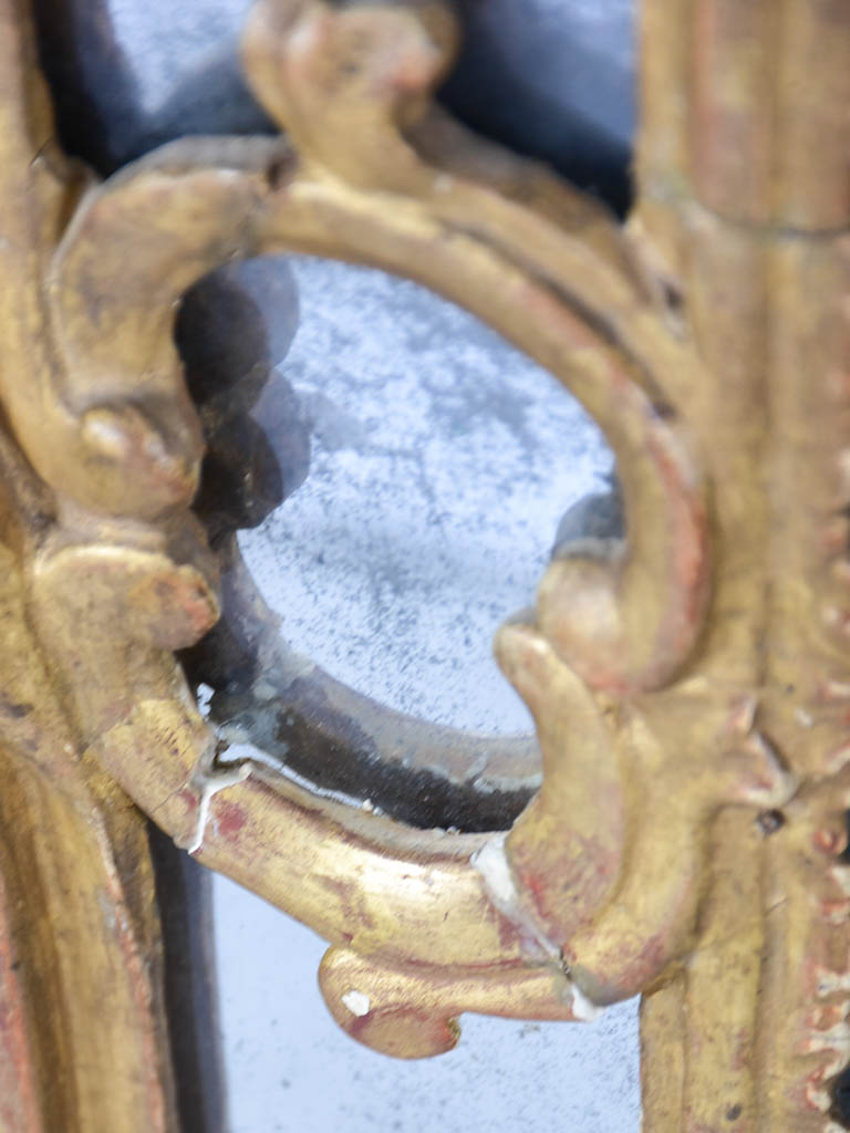 Large 18th century French gilt mirror with flower basket pediment 29½"x 59½"