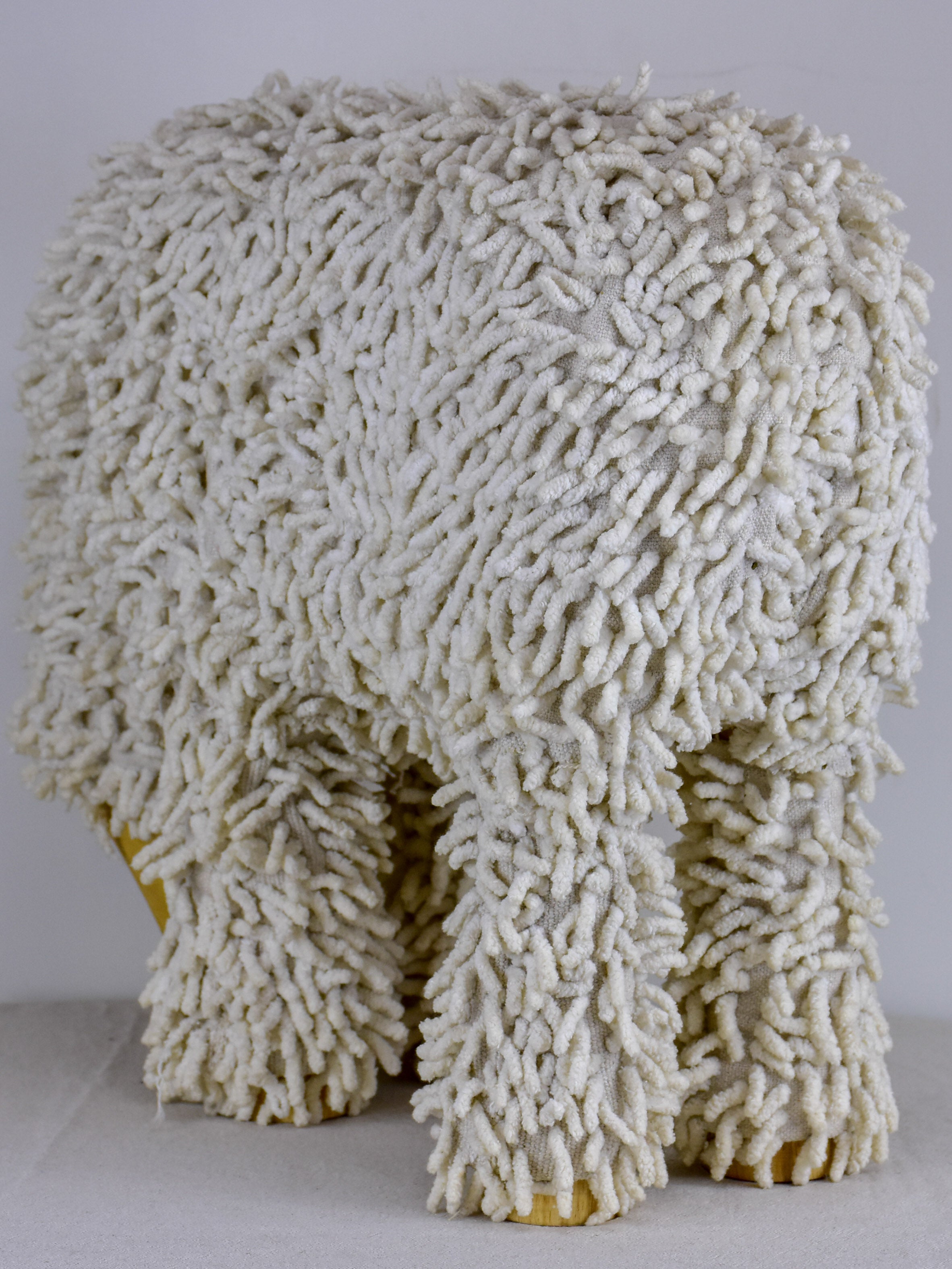 Vintage sculpture of a grazing sheep