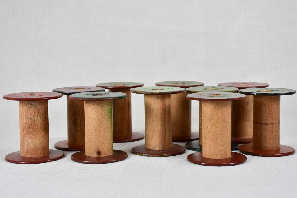 Collection of ten antique wooden bobbins