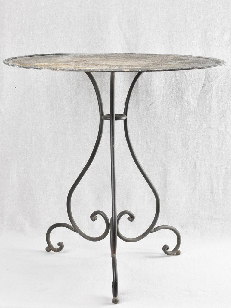 Antique French garden table with wrought iron base