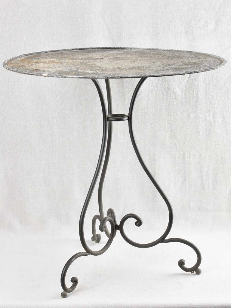 Antique French garden table with wrought iron base