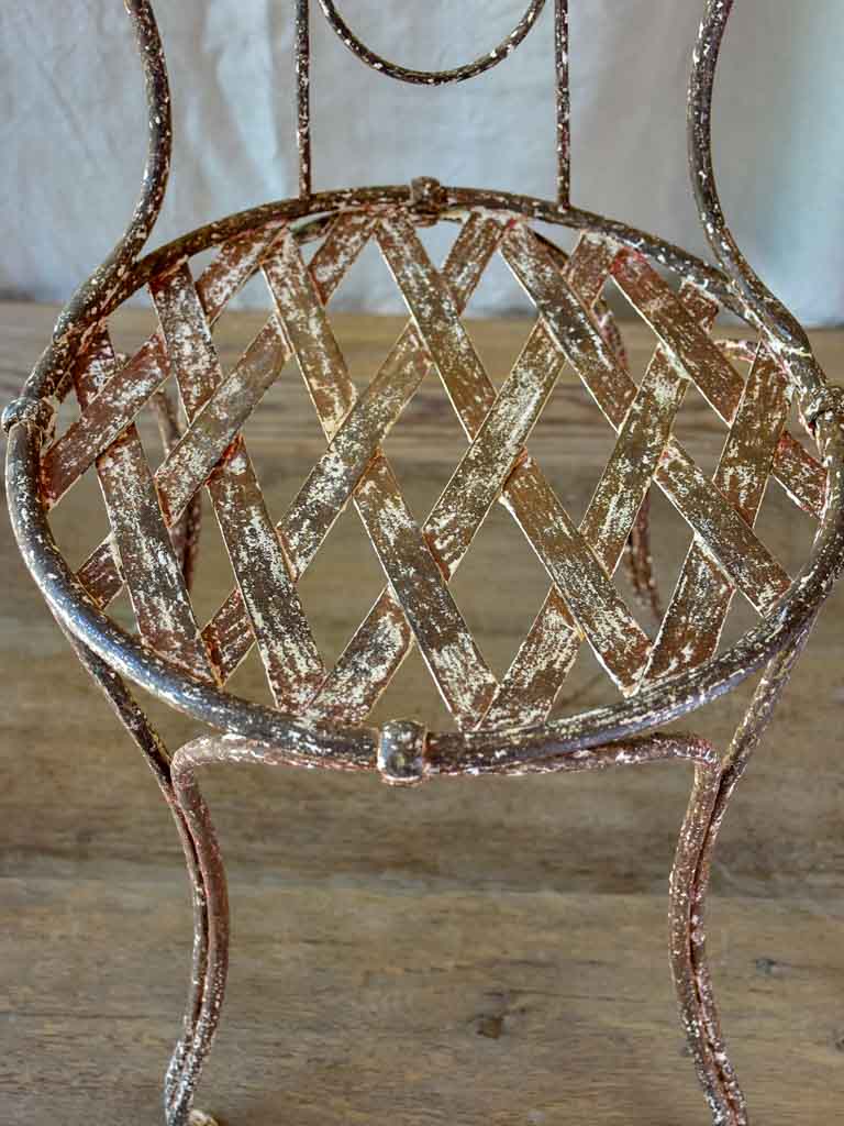 Three antique French iron garden chairs