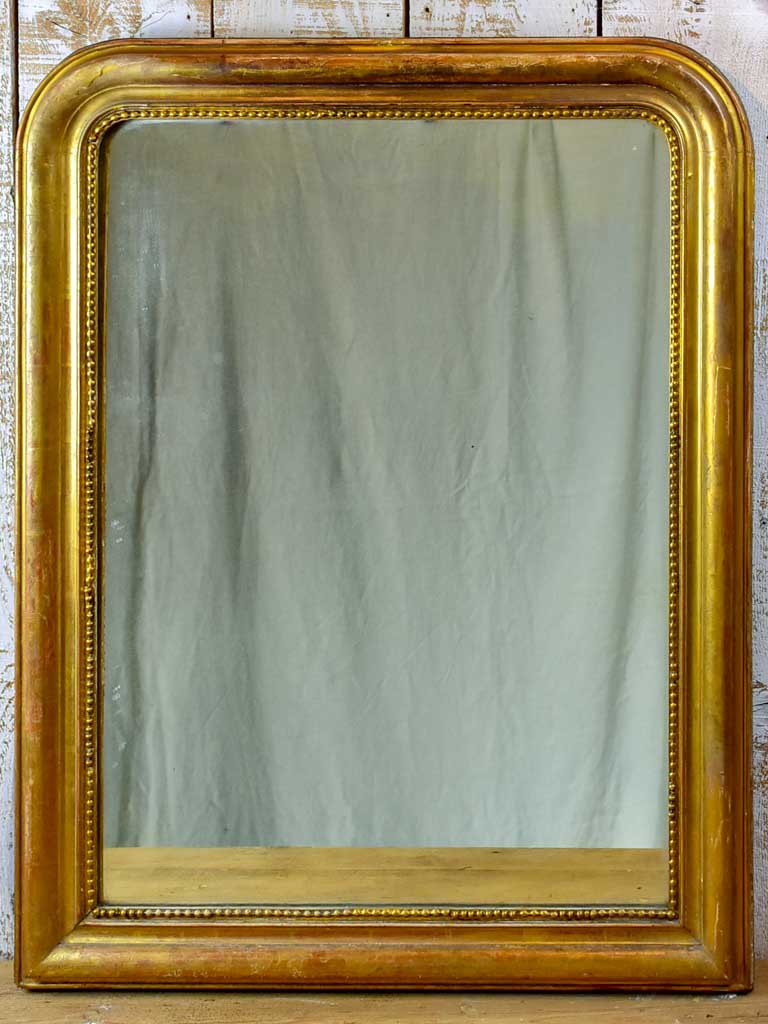 19th Century French Louis Philippe mirror with gilded frame and running pearl 28¼" x 37½"