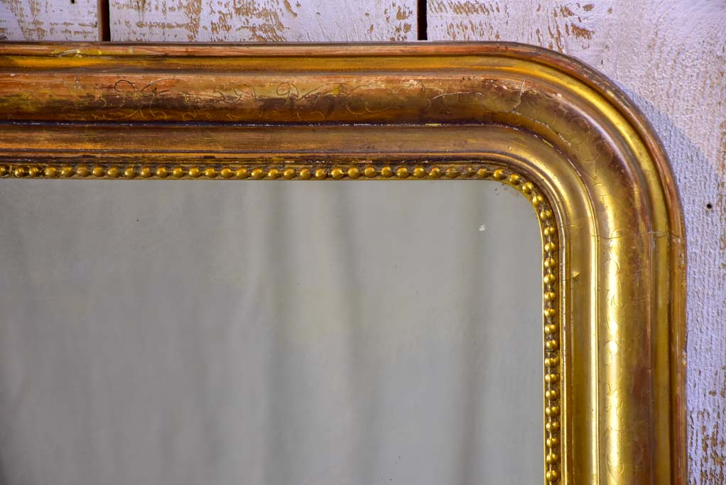 19th Century French Louis Philippe mirror with gilded frame and running pearl 28¼" x 37½"