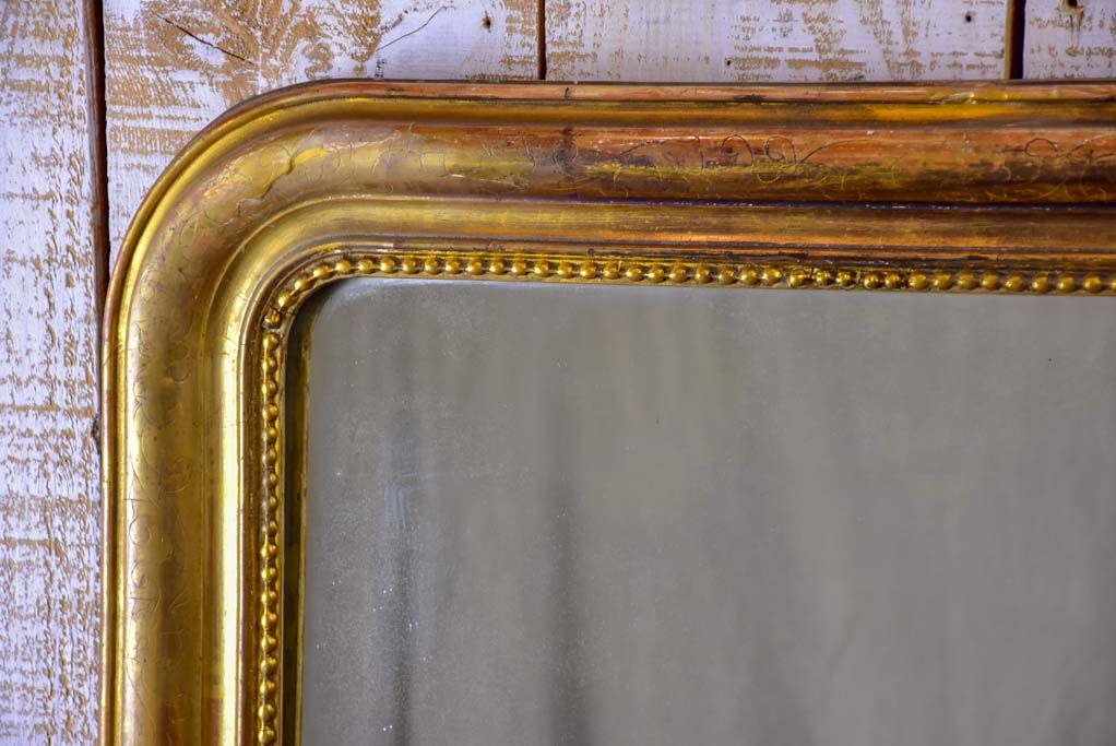 19th Century French Louis Philippe mirror with gilded frame and running pearl 28¼" x 37½"