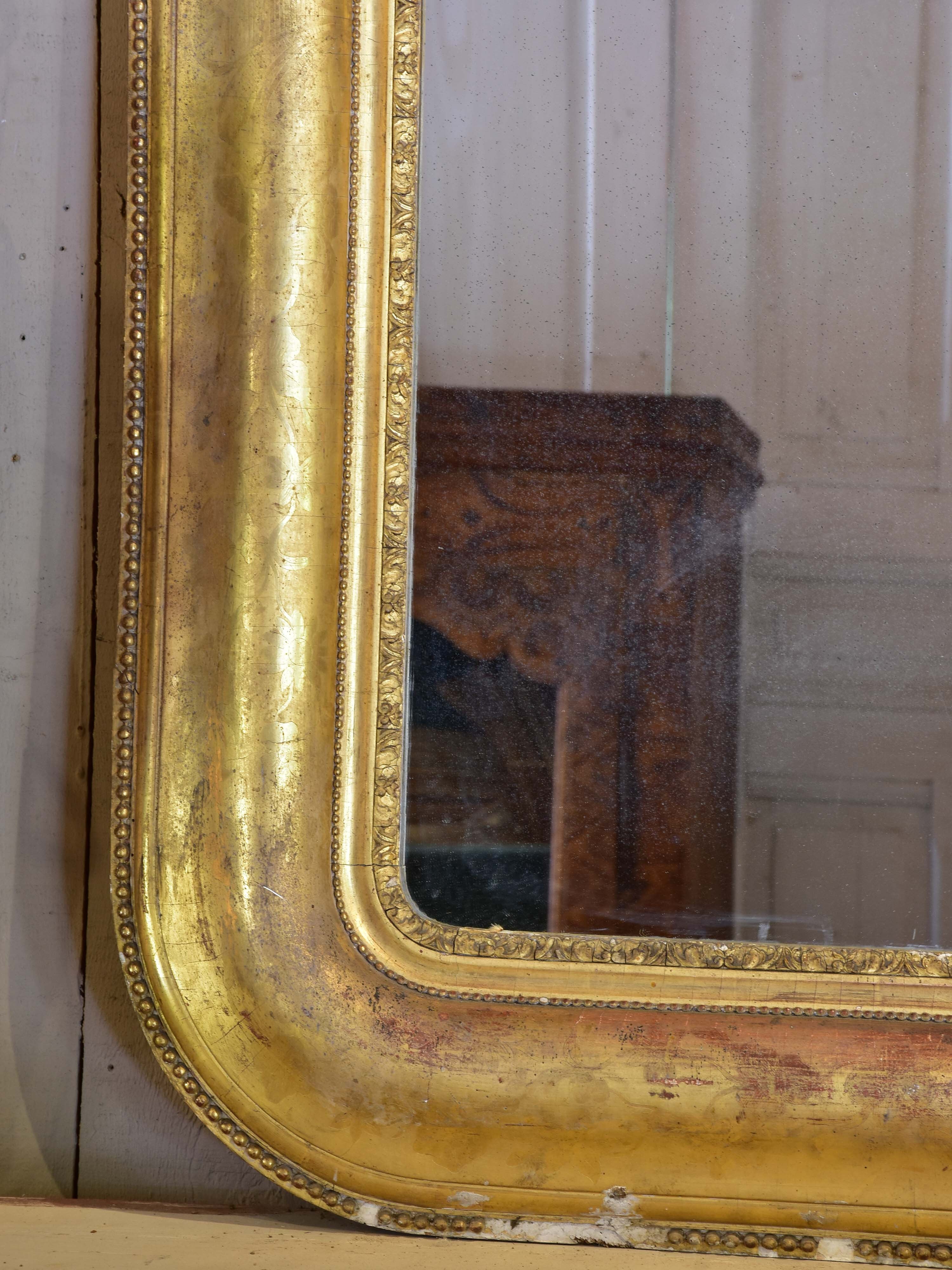 Very large antique French gilded mirror