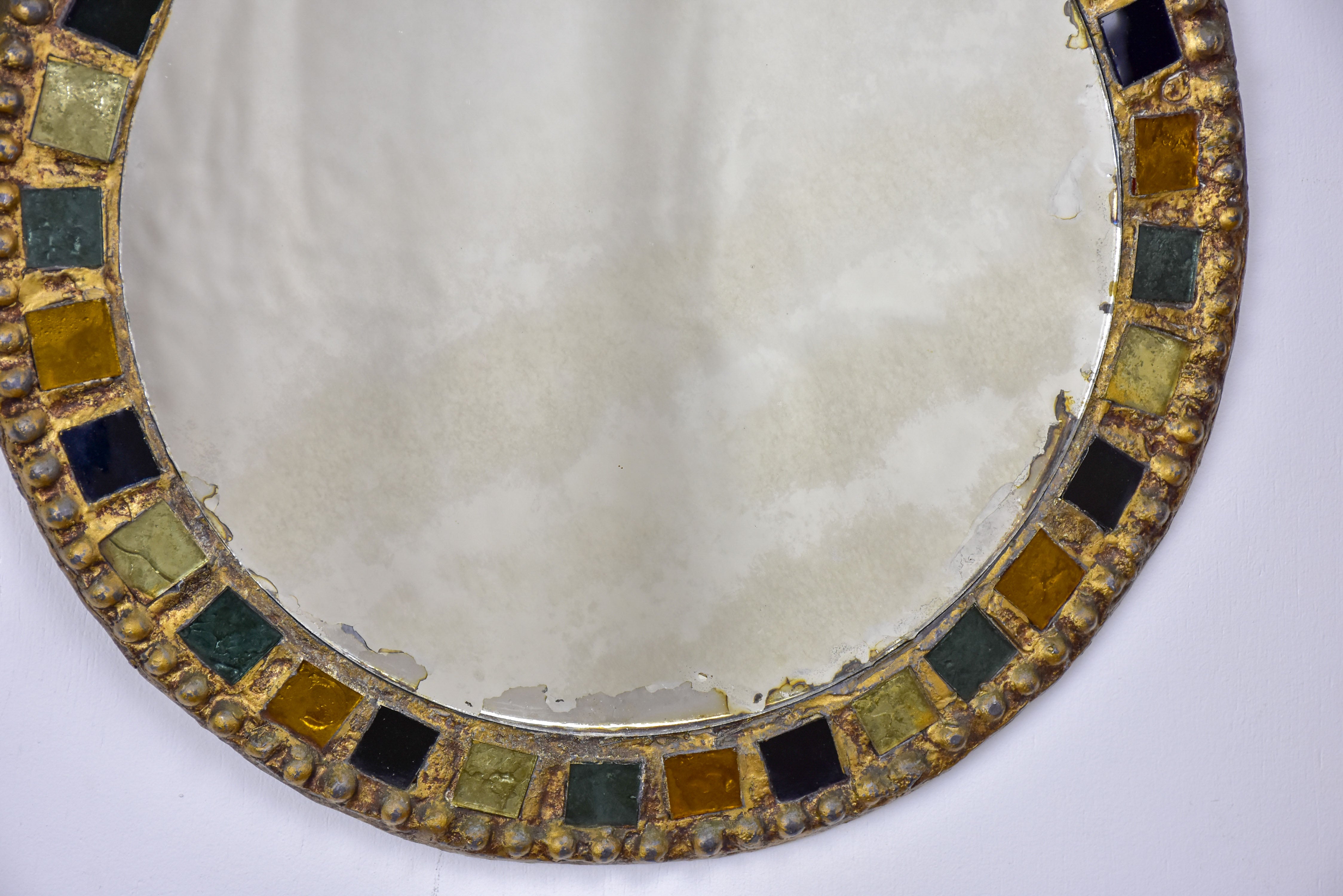 Small round mirror in the style of Line Vautrin