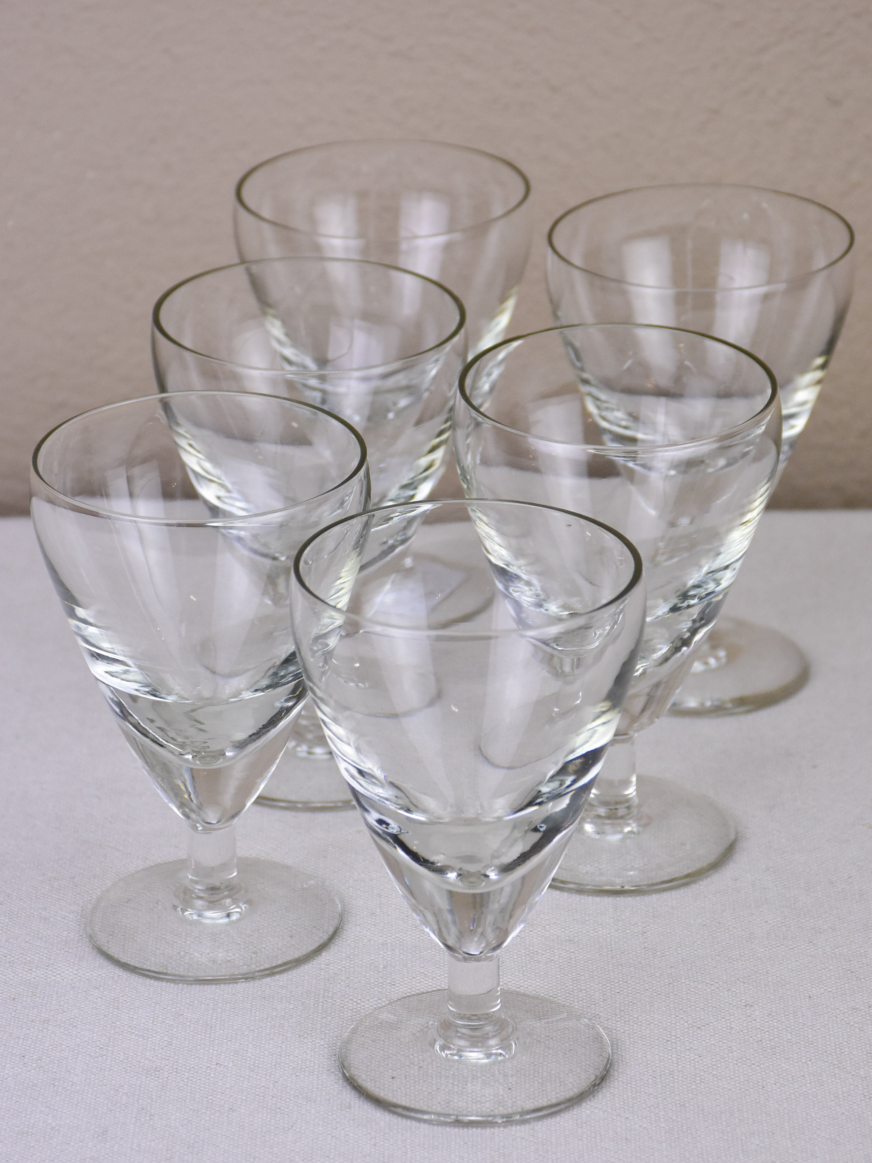 Six antique French wine glasses