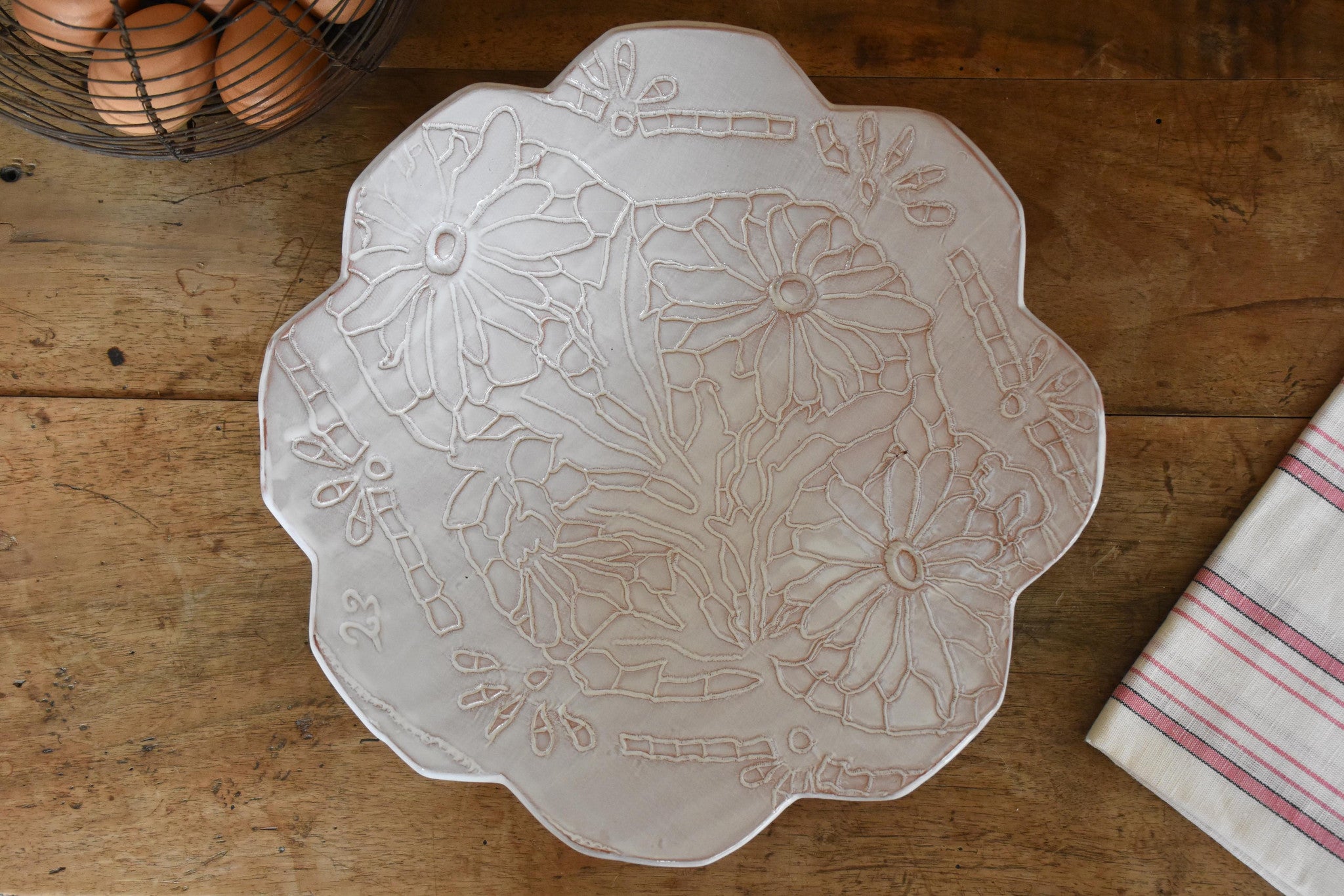 Fruit bowl with flowers and petal edges