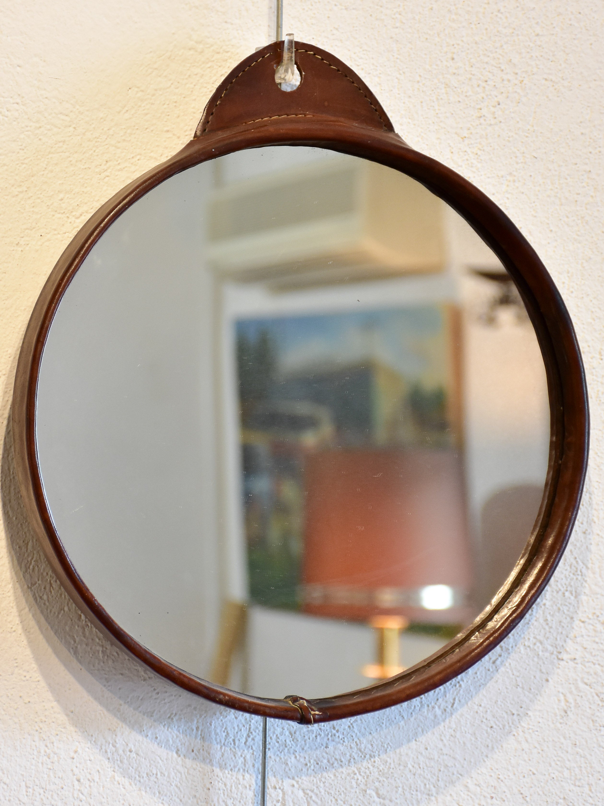 Vintage round mirror with leather frame