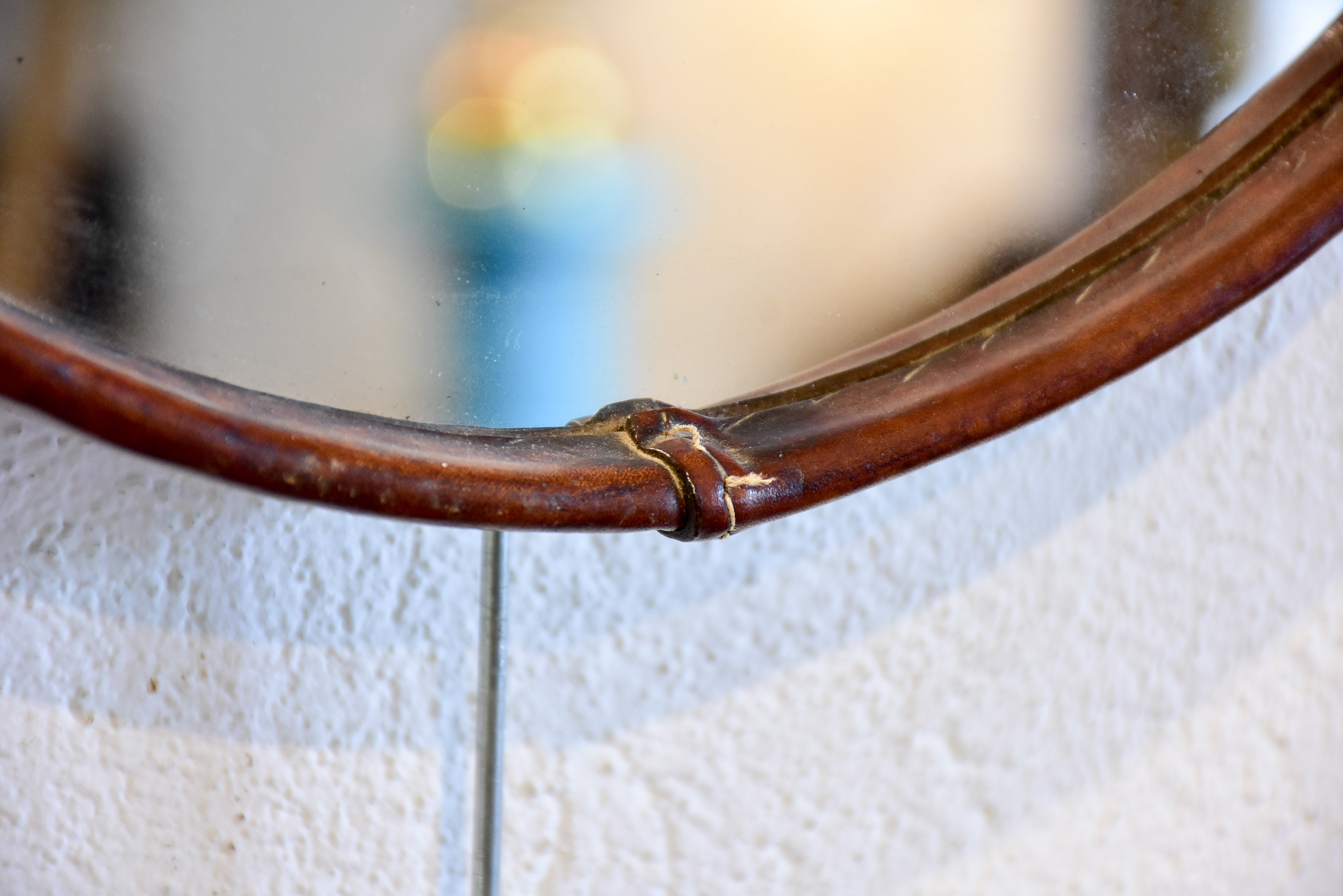 Vintage round mirror with leather frame