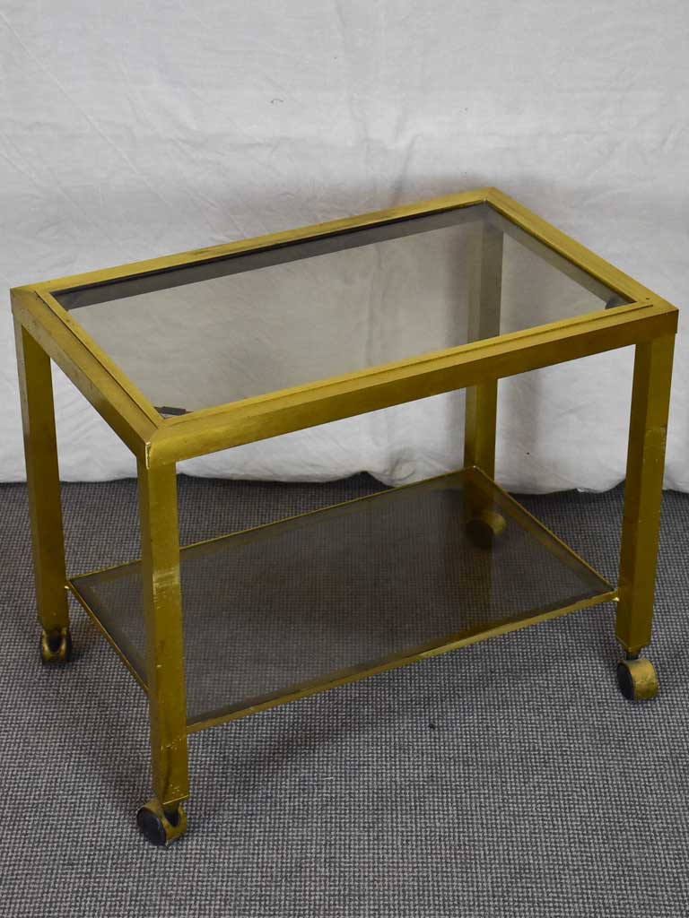 Mid century side table on wheels - glass and brass