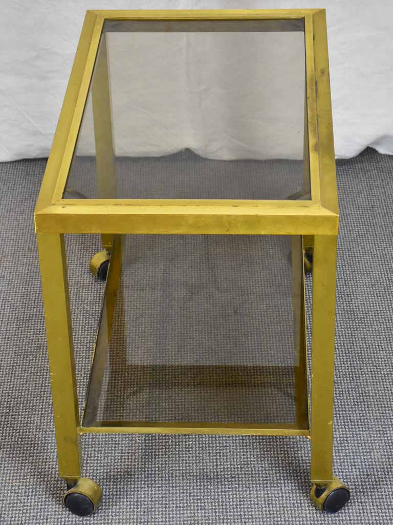 Mid century side table on wheels - glass and brass