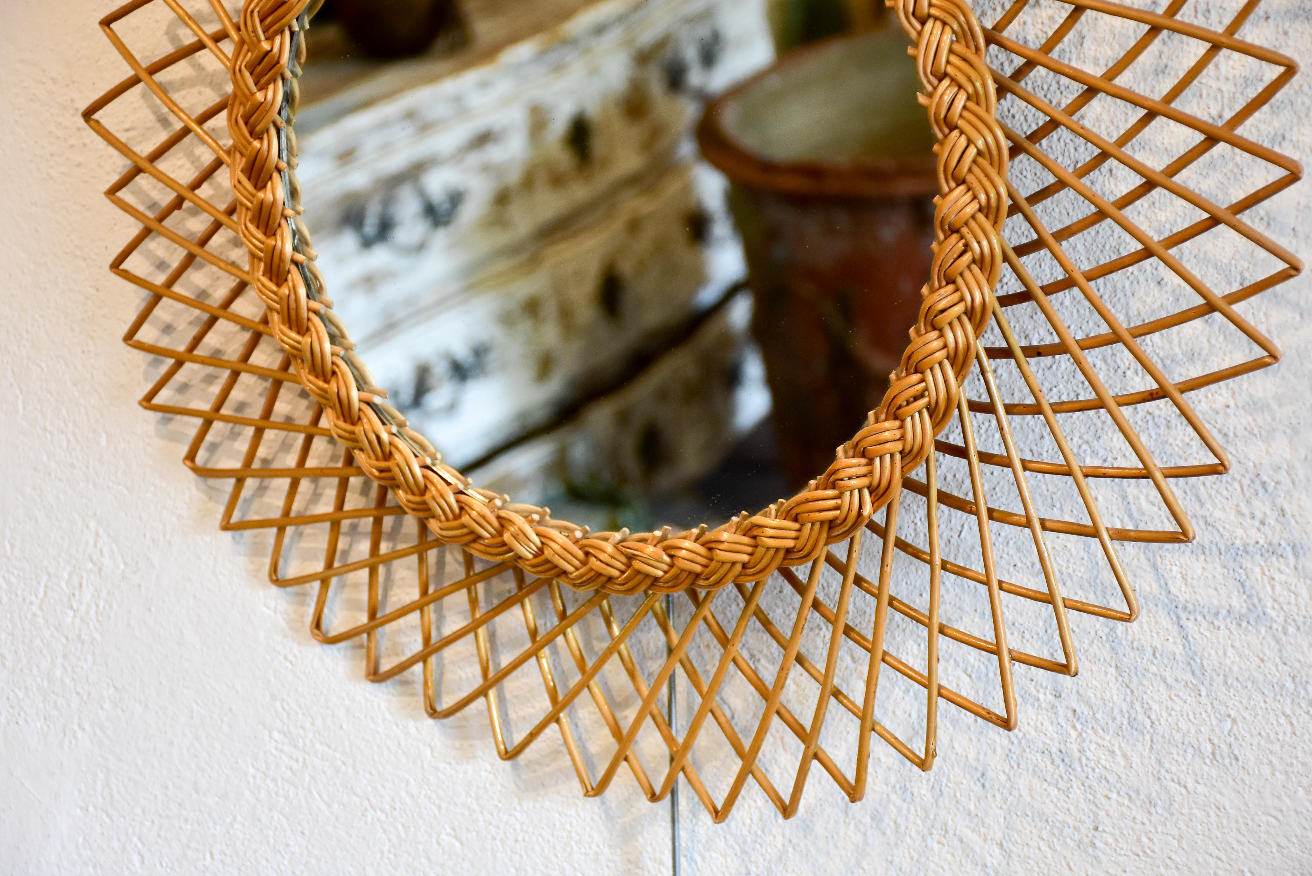 Vintage sunburst mirror with rattan frame