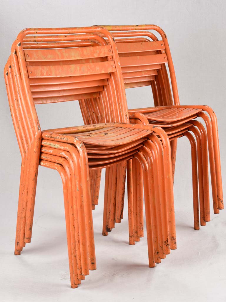 Set of 10 Tolix chairs from the 1950s with orange patina