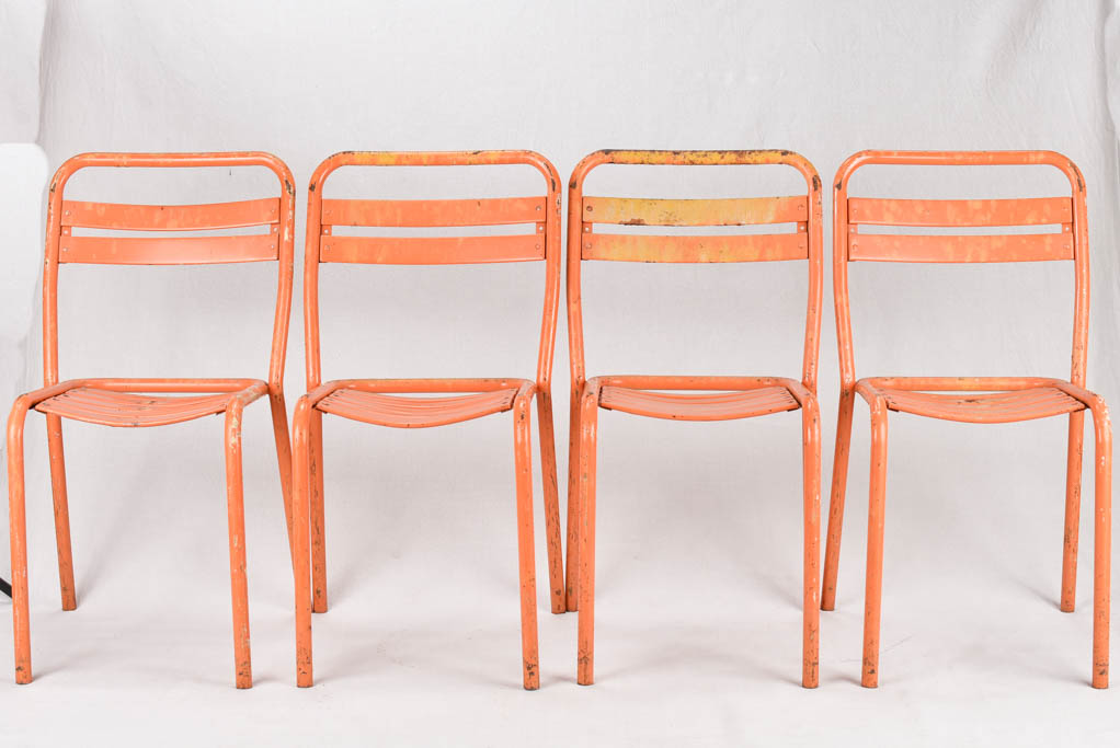 Set of 10 Tolix chairs from the 1950s with orange patina