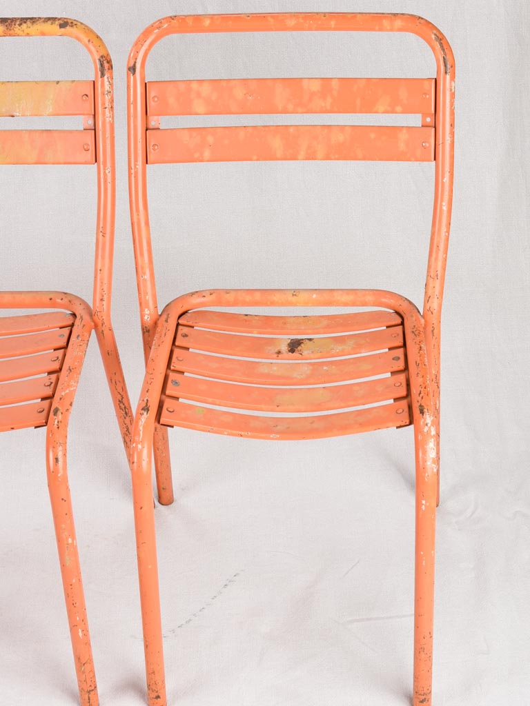 Set of 10 Tolix chairs from the 1950s with orange patina