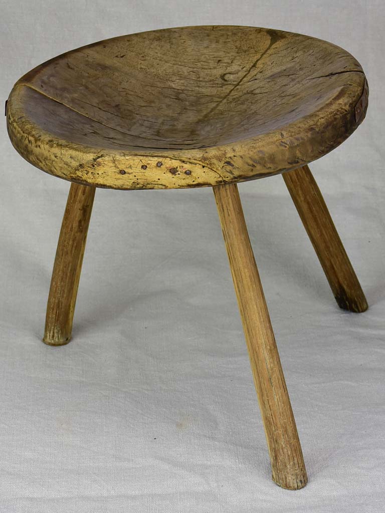 Antique French primitive milking stool with repairs