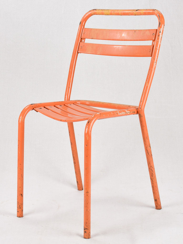 Set of 10 Tolix chairs from the 1950s with orange patina