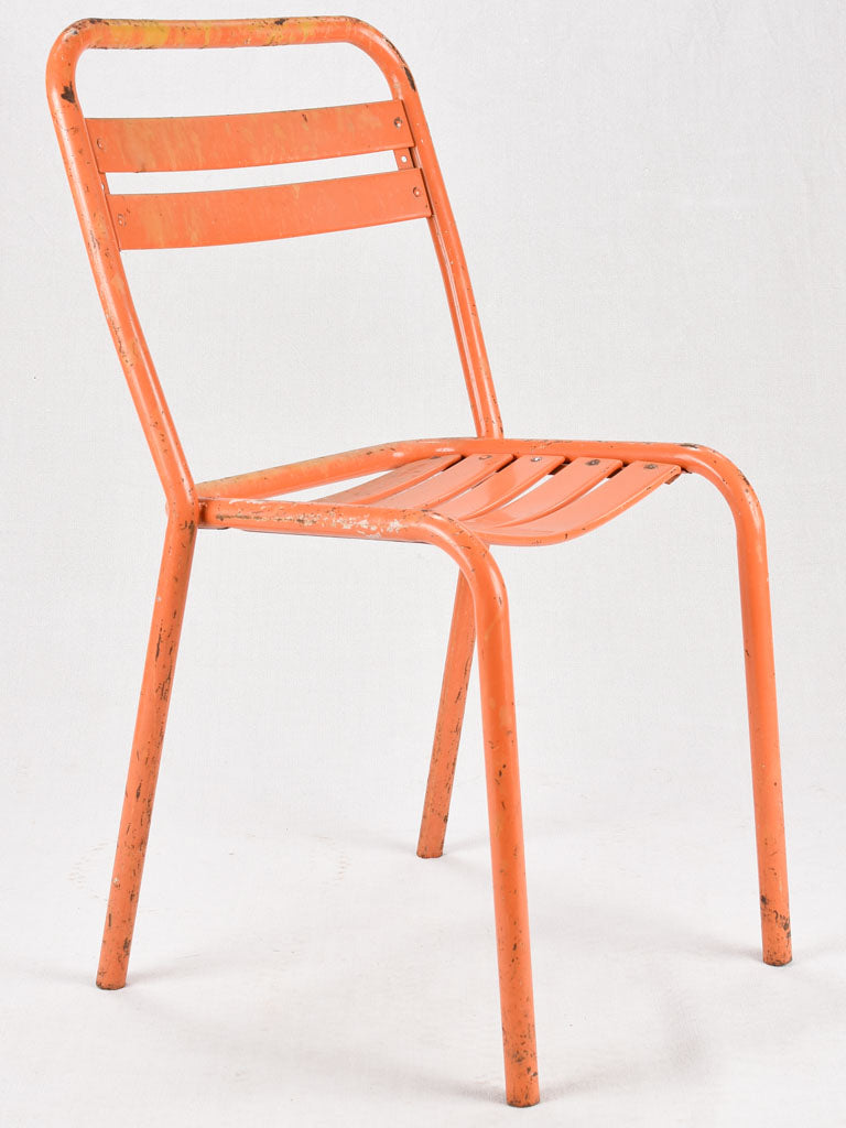 Set of 10 Tolix chairs from the 1950s with orange patina