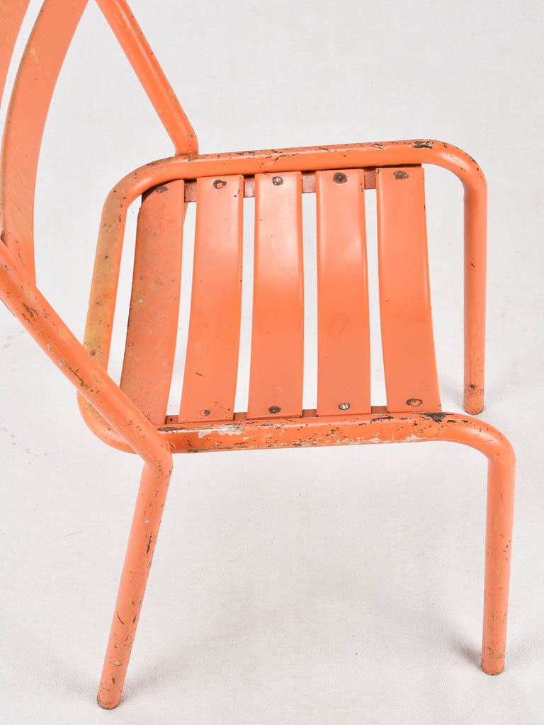 Set of 10 Tolix chairs from the 1950s with orange patina