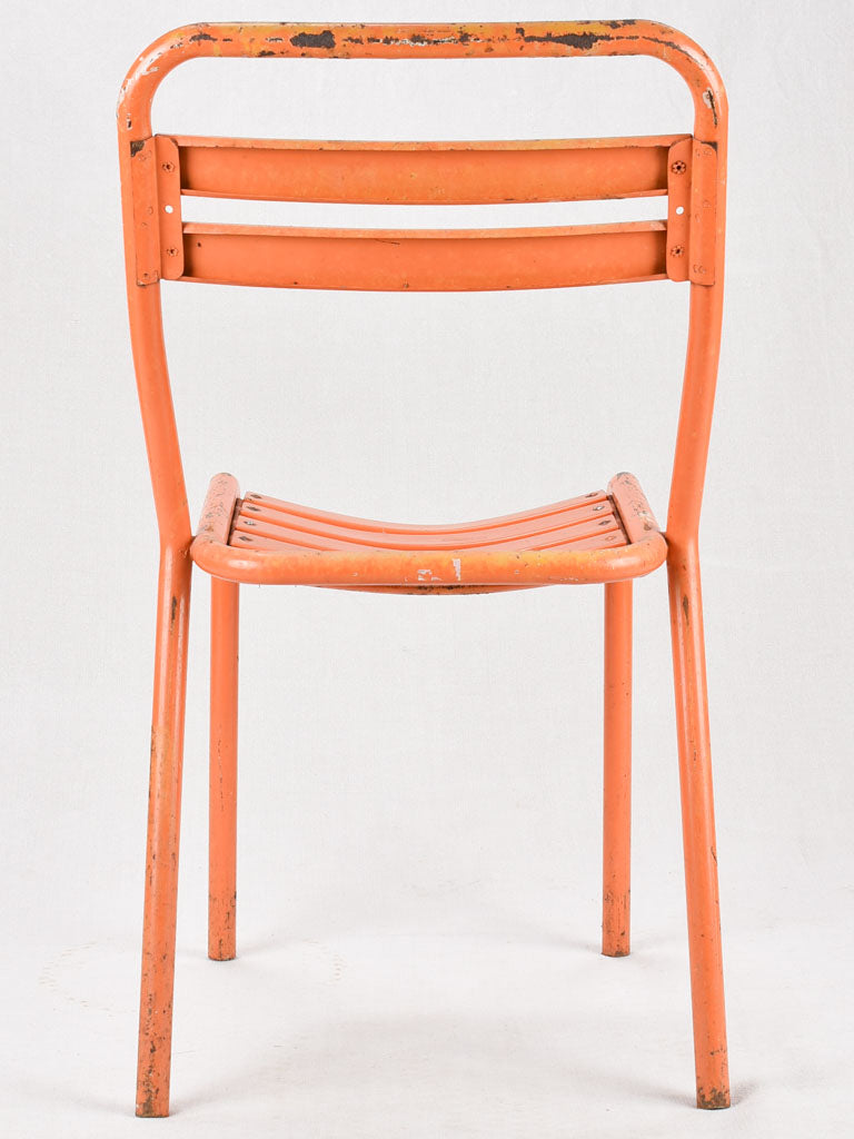 Set of 10 Tolix chairs from the 1950s with orange patina