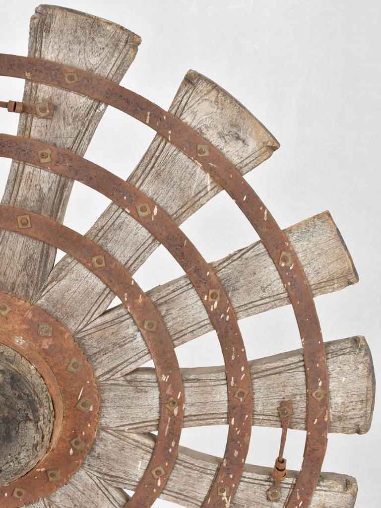 Primitive wooden sunburst sculptures