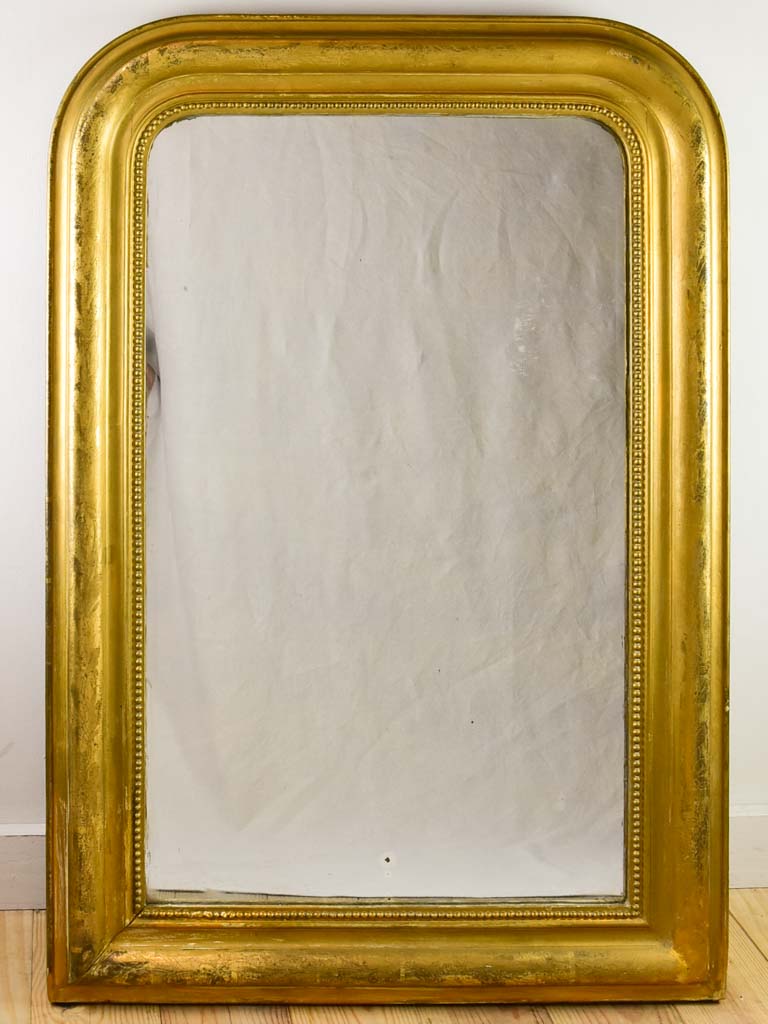 Large gilt Louis Philippe mirror with running pearl 28¾"43"