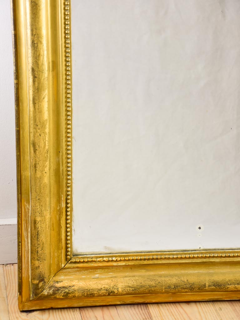 Large gilt Louis Philippe mirror with running pearl 28¾"43"