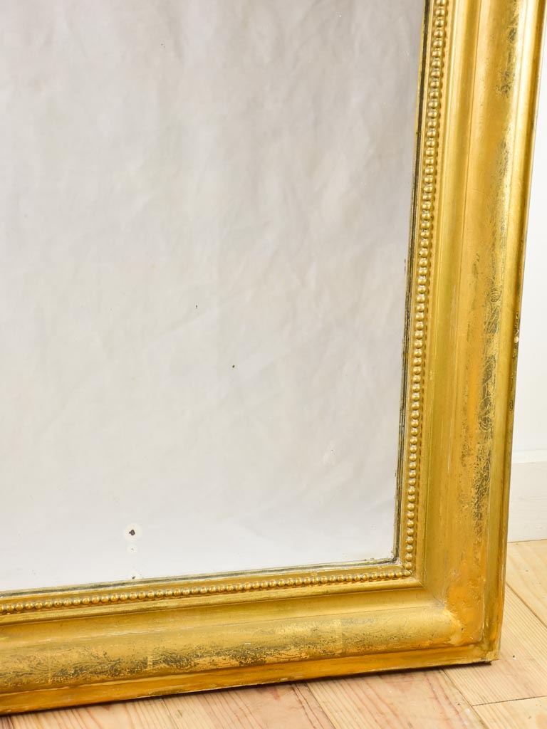 Large gilt Louis Philippe mirror with running pearl 28¾"43"