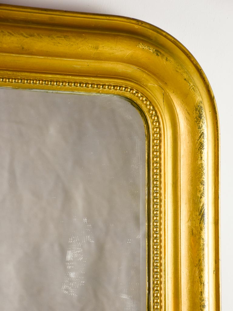 Large gilt Louis Philippe mirror with running pearl 28¾"43"