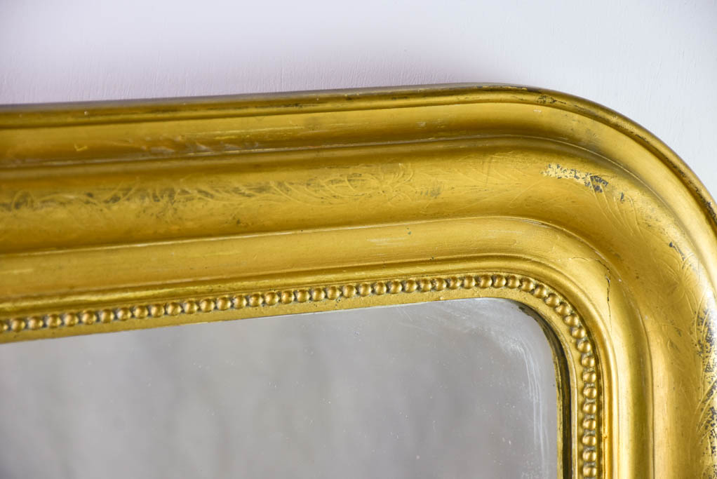 Large gilt Louis Philippe mirror with running pearl 28¾"43"