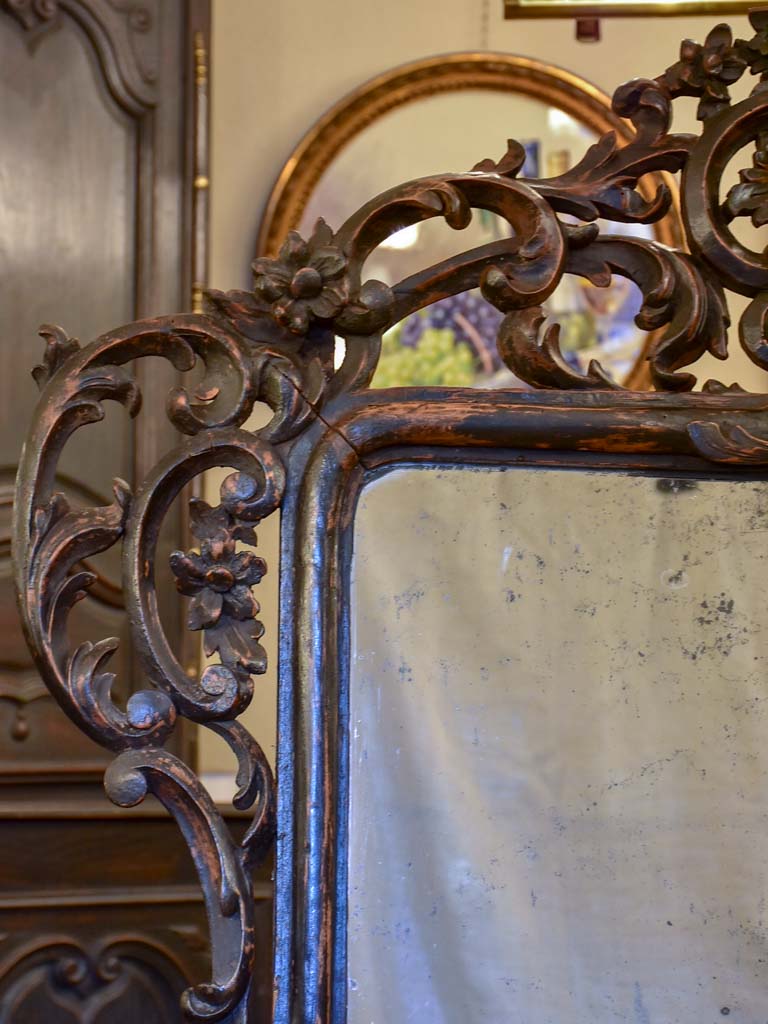 Large late 18th Century carved wood mirror with original black patina and aged glass 45¾" x 63½"