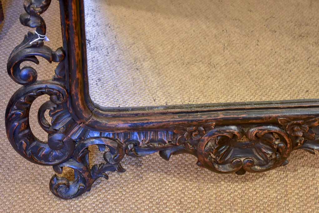 Large late 18th Century carved wood mirror with original black patina and aged glass 45¾" x 63½"