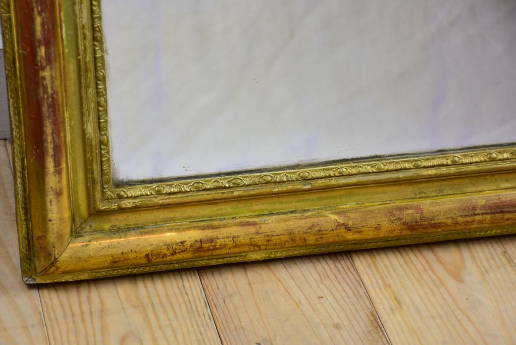 Timeworn gilt Louis Philippe mirror from the 19th century 27¼" x 37¾"