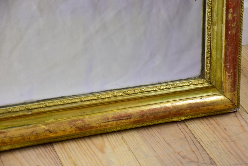 Timeworn gilt Louis Philippe mirror from the 19th century 27¼" x 37¾"