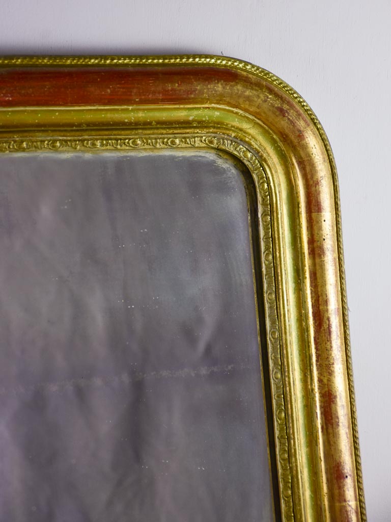 Timeworn gilt Louis Philippe mirror from the 19th century 27¼" x 37¾"