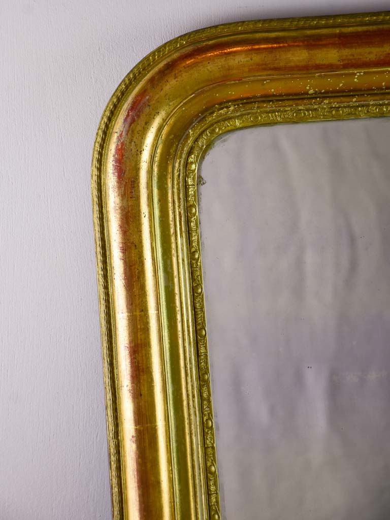 Timeworn gilt Louis Philippe mirror from the 19th century 27¼" x 37¾"