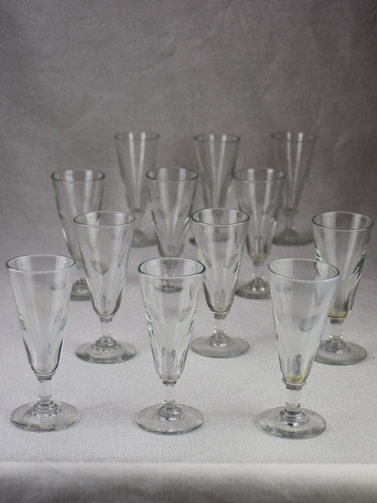 Rare set of 12 blown glass champagne flutes from the early 20th century